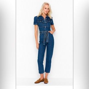 Brand new denim jumpsuit tags still attached.